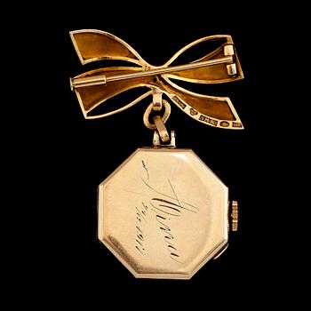 BROSCHUR, 14 och 18 k guld, 1900-talets första hälft. Total vikt med urverk ca 13 gram.
