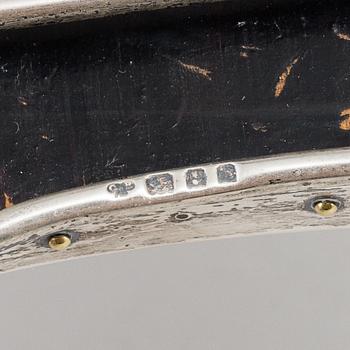 CHARLES & RICHARD COMYNS, a silver table clock from London, England, 1903.