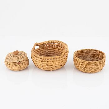 Three small root baskets, two signed.