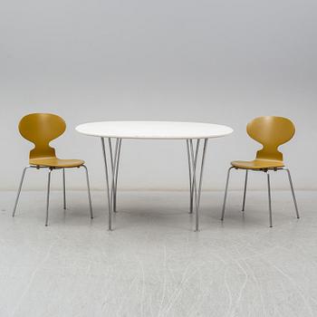 BRUNO MATHSSON & PIET HEIN, and ARNE JACOBSEN, a 'Supercirkel' table and two 'Myran' chairs, from Fritz Hansen.