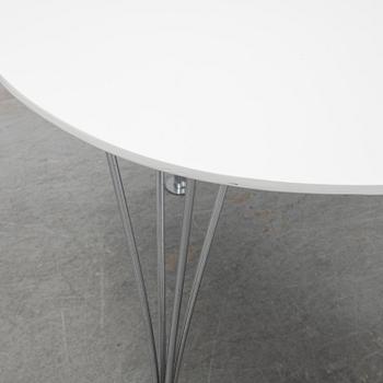 A 'Trisuper-elliptical' table by Bruno Mathsson & Piet Hein for Mathsson International.