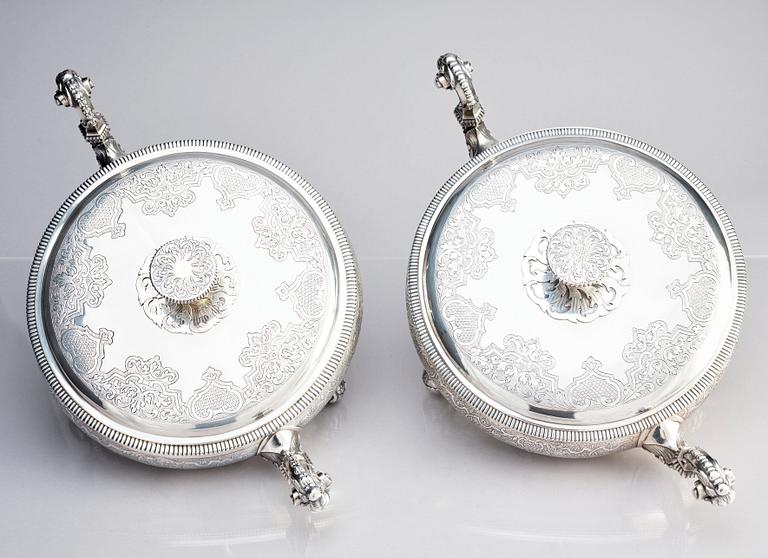 A pair of Swedish parcel-gilt silver bowls with covers, mark of S.A.Ackland, 1953 and 1963.