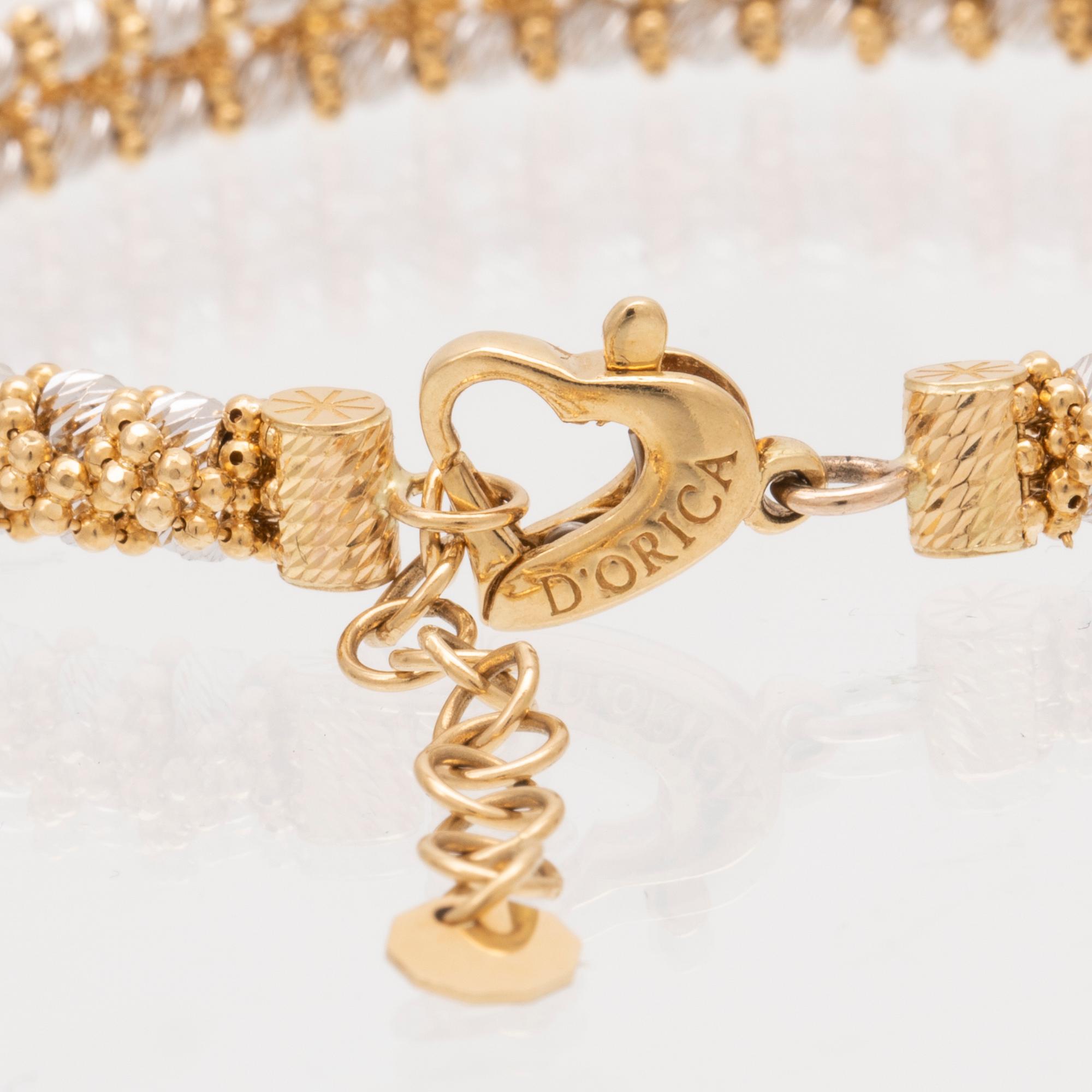 An 18K white and red gold necklace by D'orica Italy.
