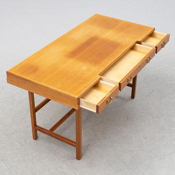 Josef Frank, a model '1022' cherry wood desk, Svenskt Tenn, post 1985.