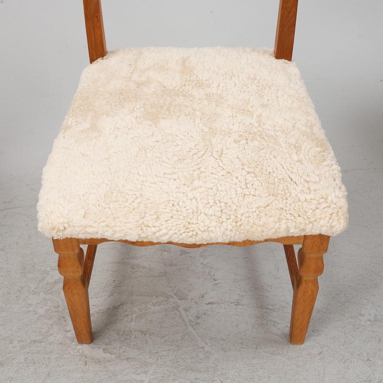 Henning Kjærnulf, a set of six oak 'Razorblade' chairs with new sheepskin upholstery, EGK, Denmark 1960s.