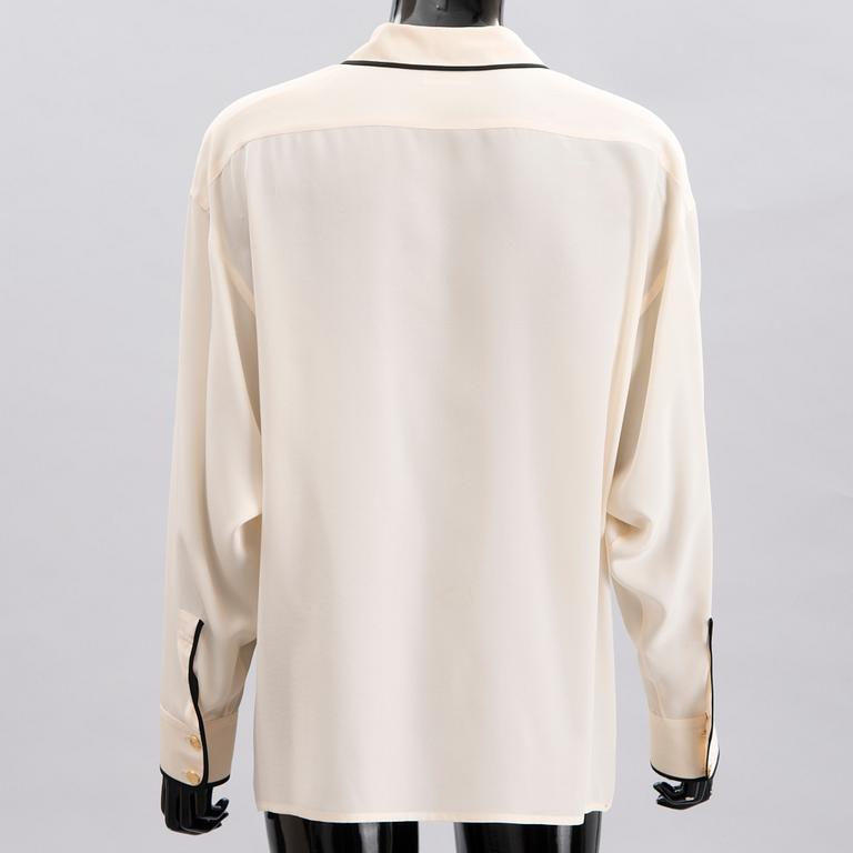 Two Chanel Crepe de Chine Cream Coloured Silk Blouses.