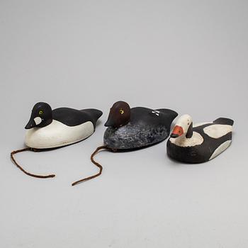 Three early 20th century painted wood birds.