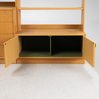 Bertil Fridhagen, an oak-veneered bookcase system, 4 sections, second half of the 20th century.