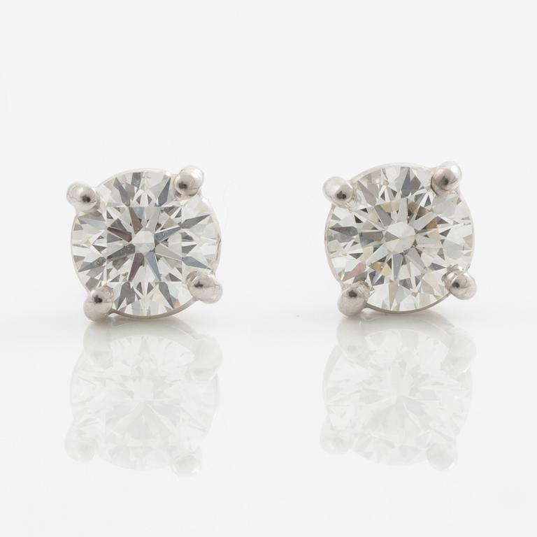 Earrings, a pair, 18K white gold with brilliant-cut diamonds totalling 0.60 ct.