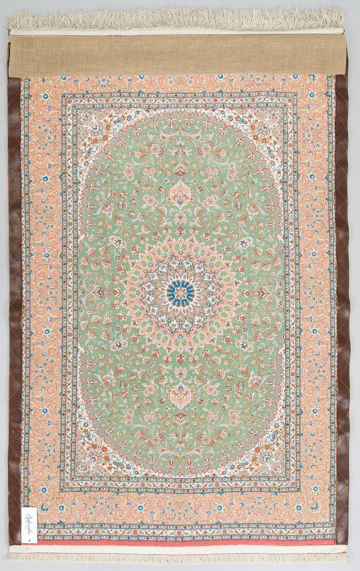 A silk Qum rug, circa 152 x 101 cm.