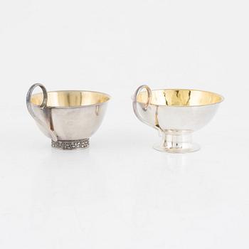 A set of twelve Swedish silver punsch mugs, including Stockholm 1965.