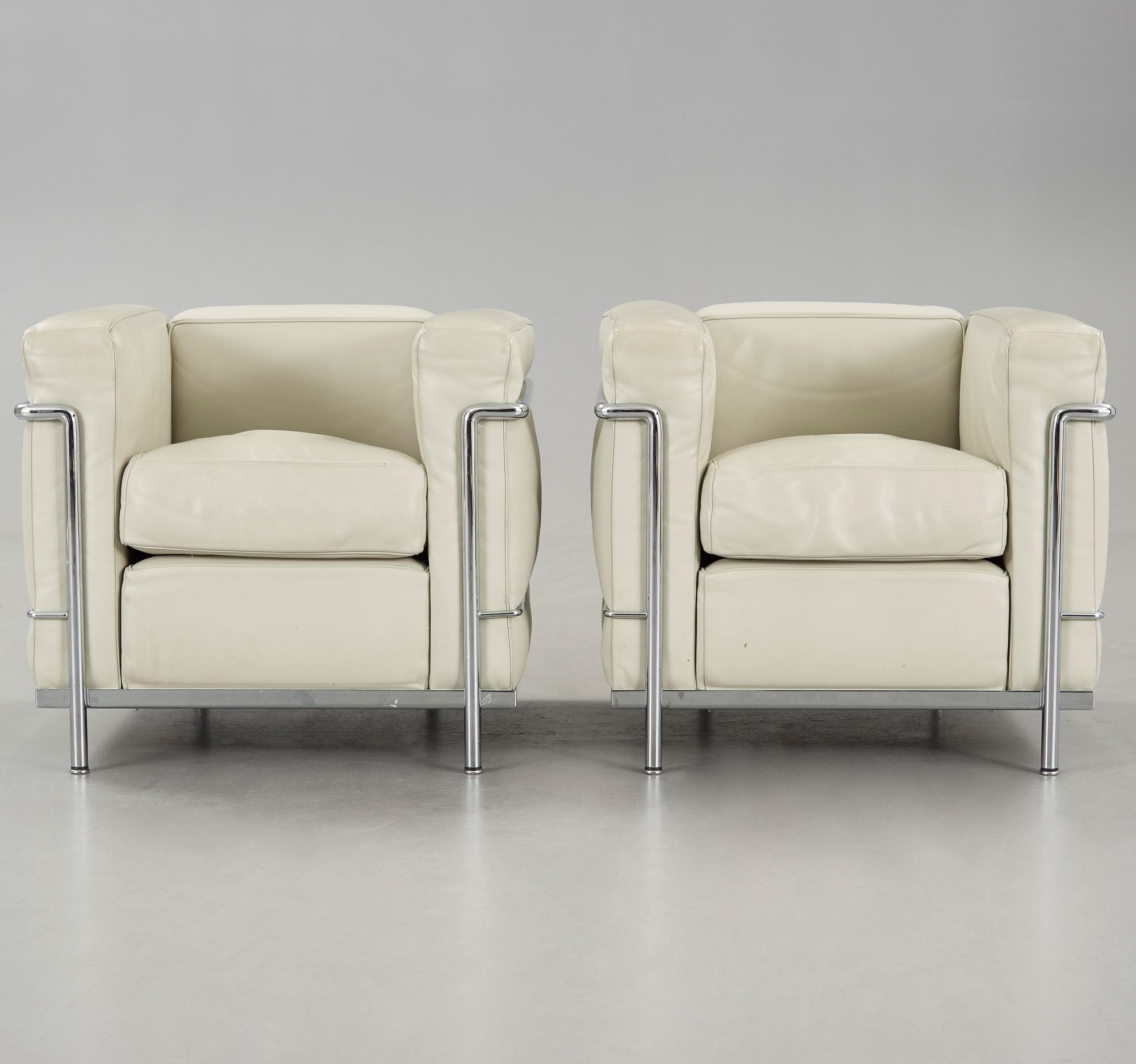 A pair of 'LC2' easy chairs designed by Le Corbusier, Cassina.