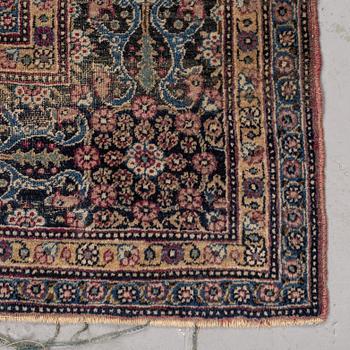 A carpet, a semi-antique Tehran, possibly, ca 220 x 142 cm.