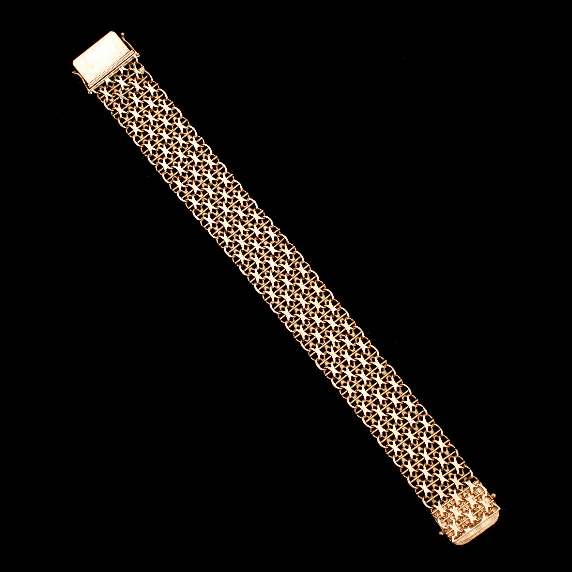 ARMBAND, 18 k guld, 1972. Vikt ca 23 g.