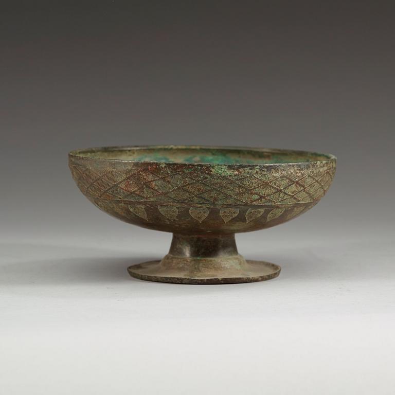 A Archaistic bronze lid for a dou vessel.