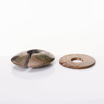 A group of four archaistic nephrite objects.