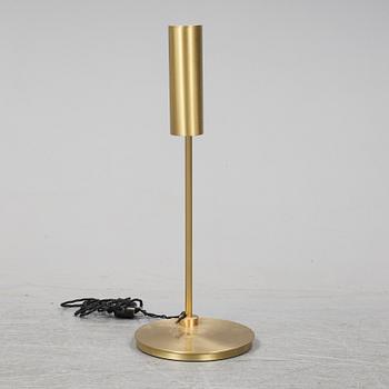 A 'Heron' brass table light by Michael Verheyden for CTO lighting.