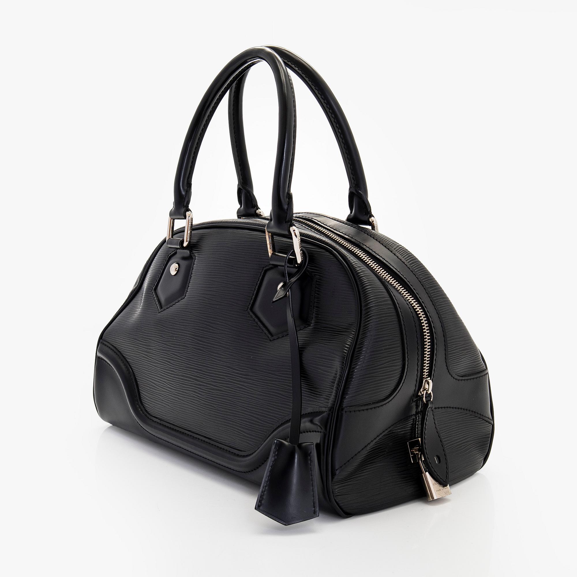Louis Vuitton, An 'Epi Montaigne PM' bag.