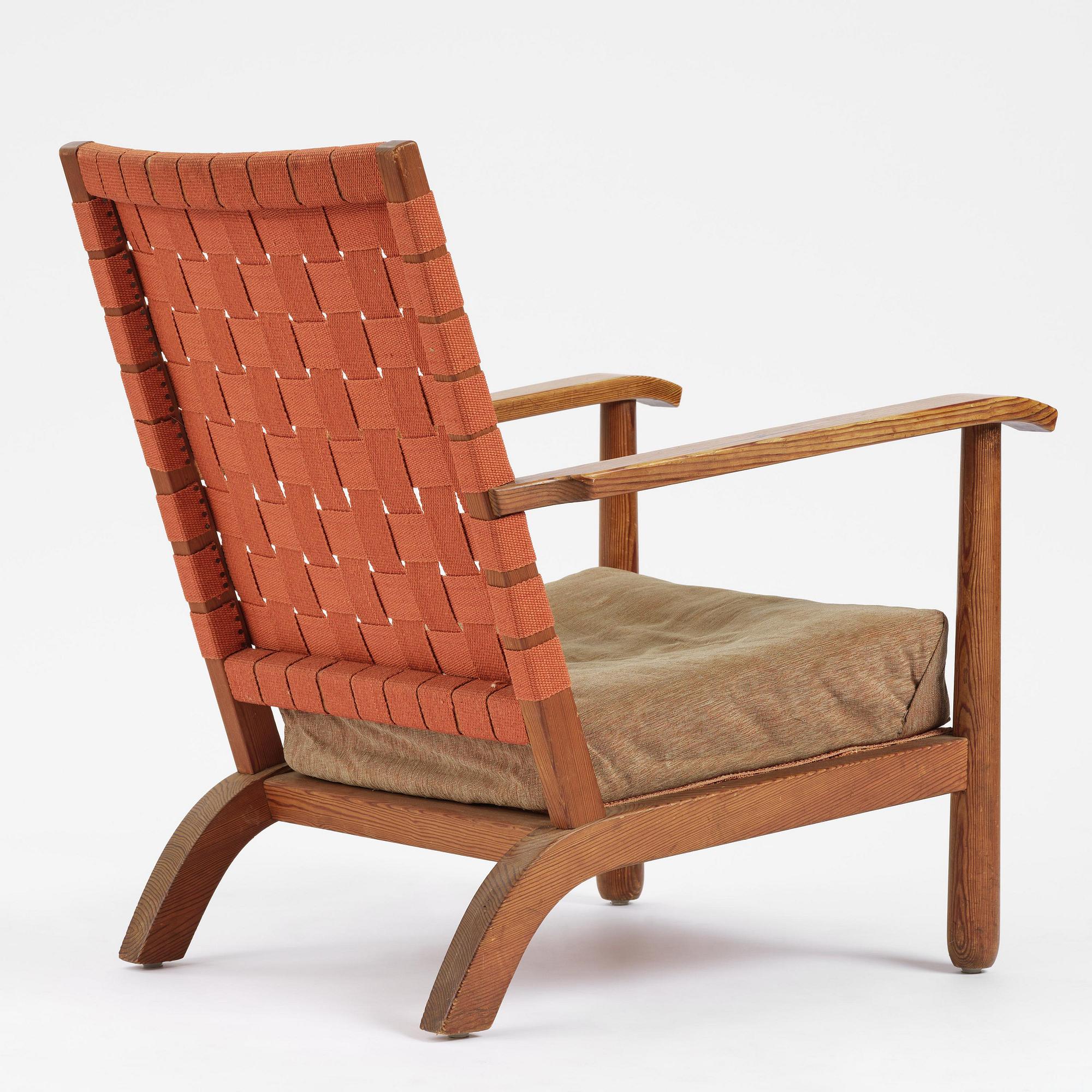 Axel Einar Hjorth, a stained pine "Väddö" easy chair, Nordiska Kompaniet, Sweden, 1930s-40s.
