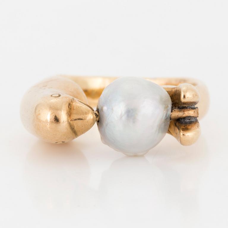 A ring with pearl.