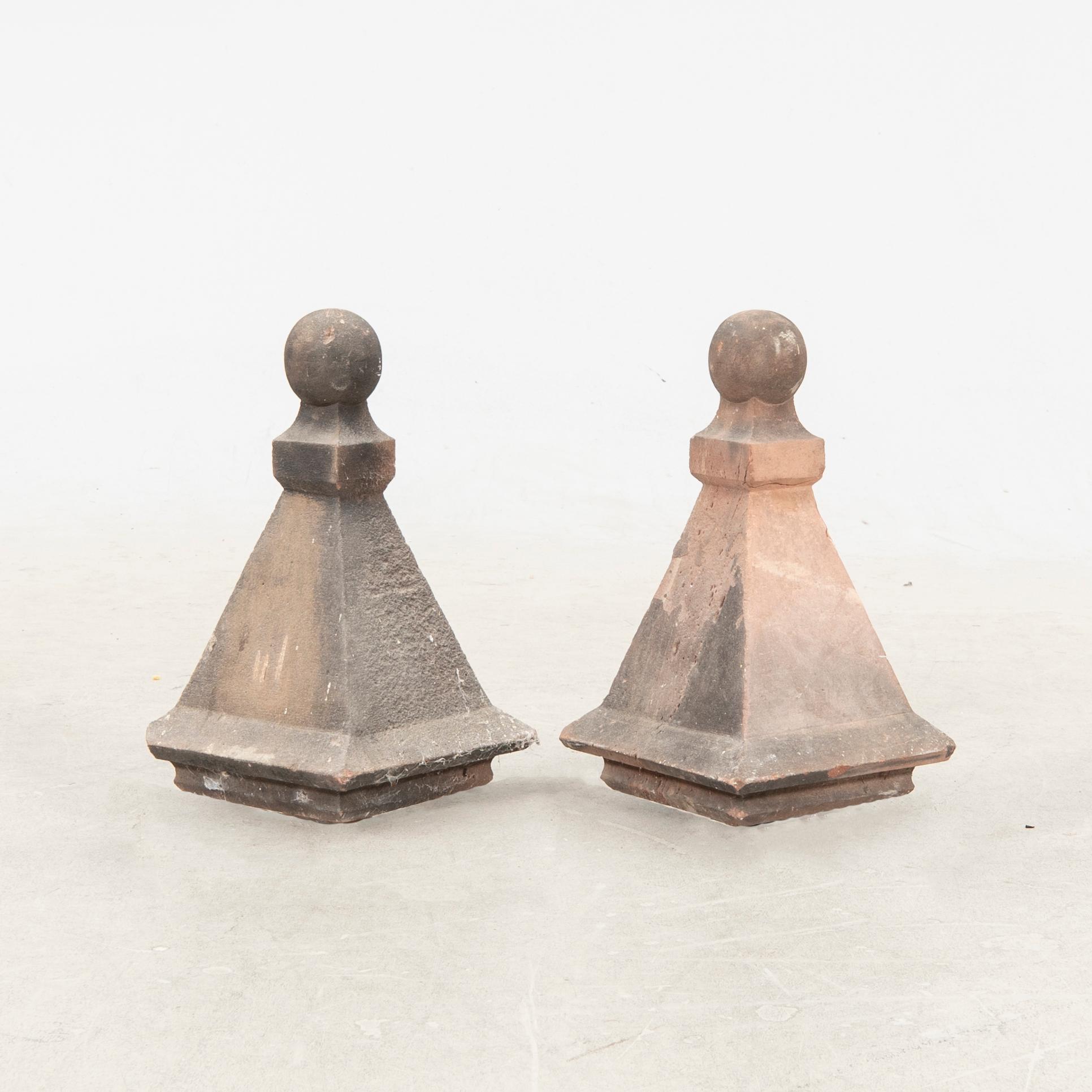 A pair 19/20.th century sandstone gate post tops.