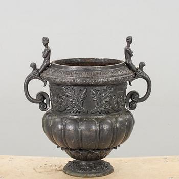 A IRON GARDEN URN.