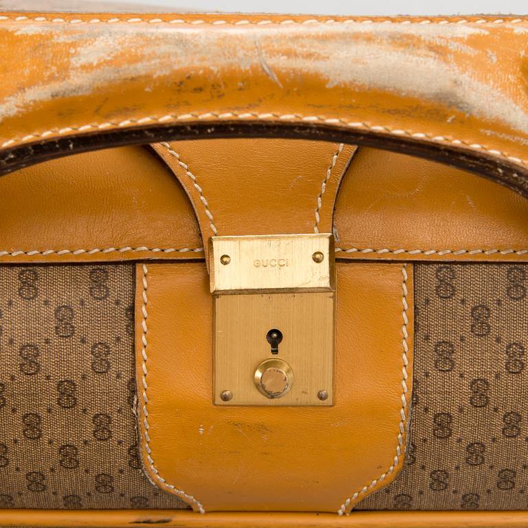 A Large Vintage Micro GG canvas Soft Suitcase.