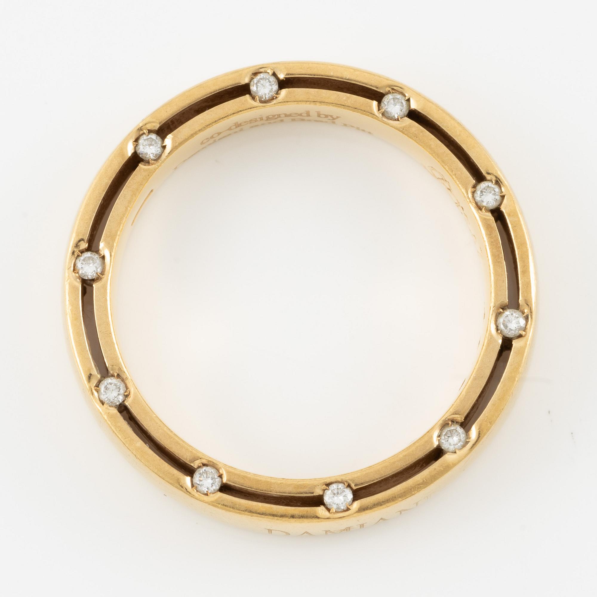 Damiani ring 18K gold with round brilliant-cut diamonds, designed in collaboration with Brad Pitt.