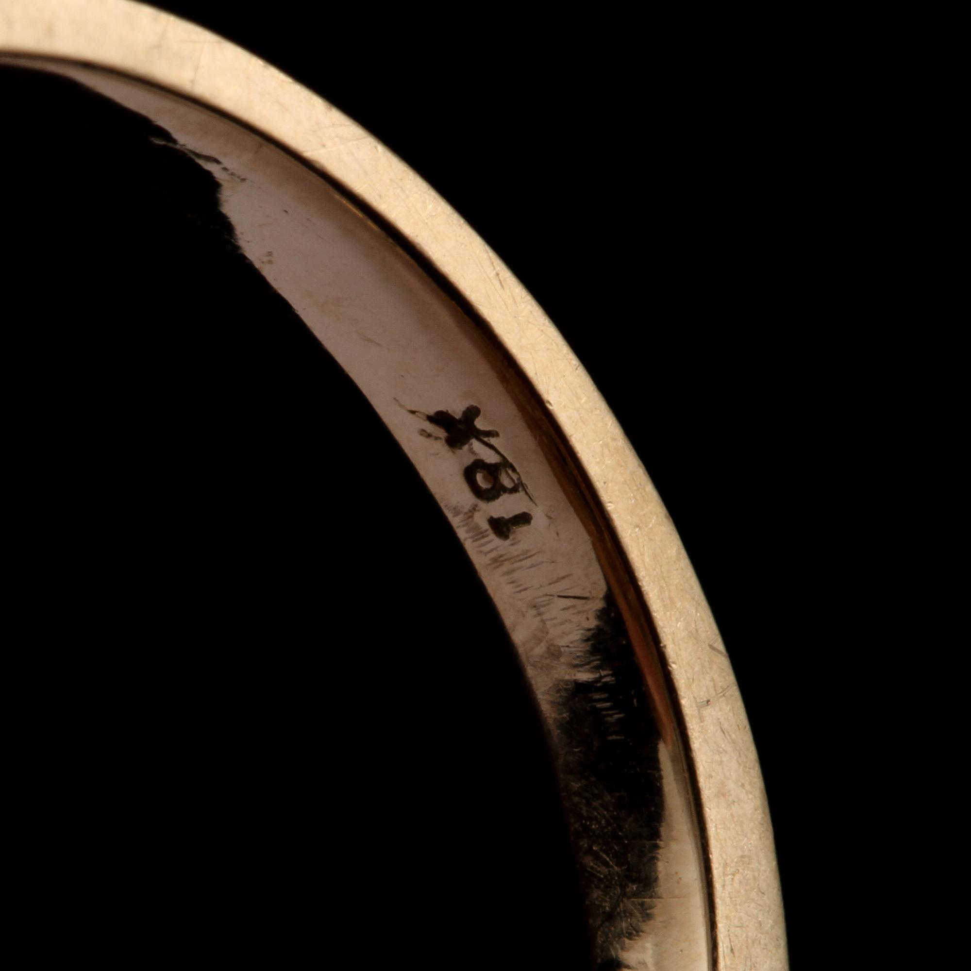 GARNITYR, 4 delar, 18k guld med fasettslipade stenar, sekelskifte 1900/2000-tal. Vikt 25 g.