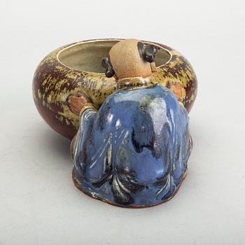 A Japanese 20th century signed porcelain figurine.