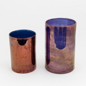 Two 'Hurricane Bronze' candle holders, Skogsberg & Smart.