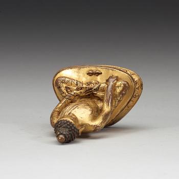 A gilt copper-alloy figure of Aksobhya Buddha, 15th/16th century, Tibet or Nepal.