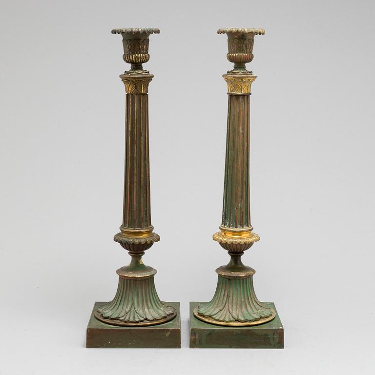 A pair of bronze gustavian candlesticks, late 18th century.