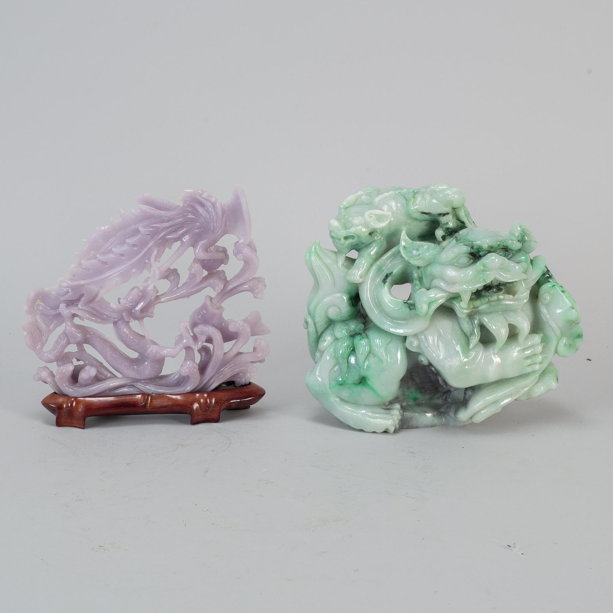 Four Chinese stone sculptures, one rose quartz, 20th century.