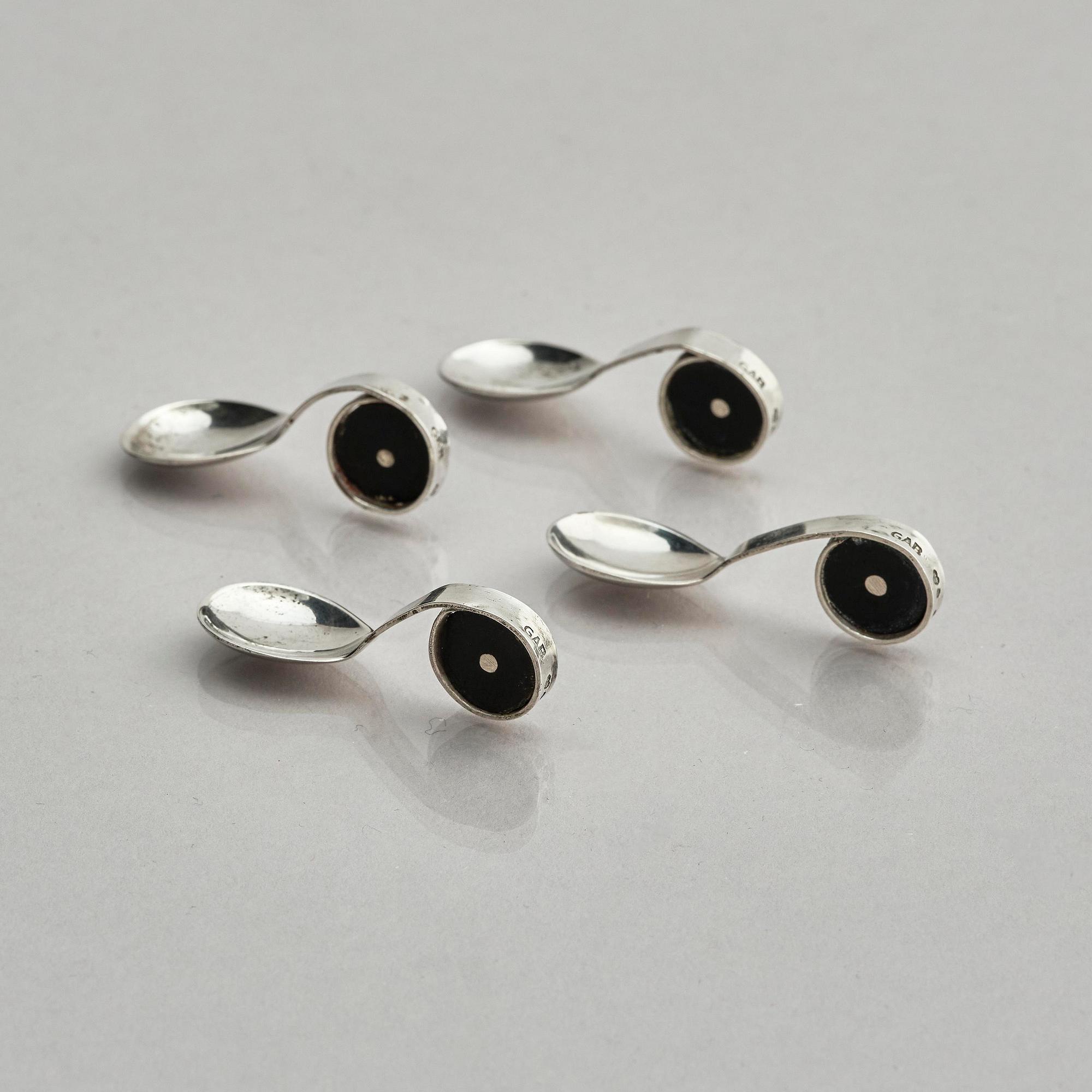 Guldsmedsaktiebolaget (GAB), four silver and bakelite salt-cellars, design by Eric Pihlgren, Stockholm, Sweden 1938.