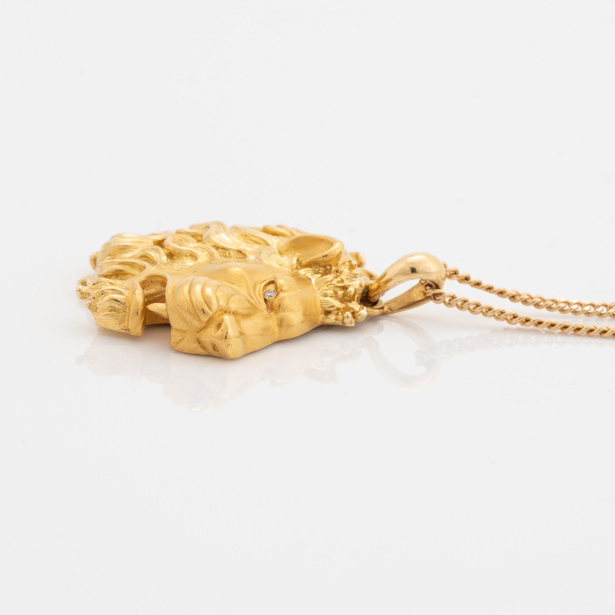Carrera y Carrera, hänge lejon 18K guld med en briljantslipad diamant, kedja 18K guld.