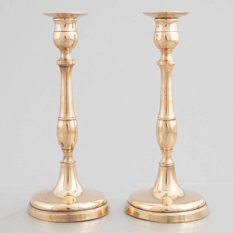 Skultuna Messinsbruk, two pairs of brass candlesticks, 19th century.