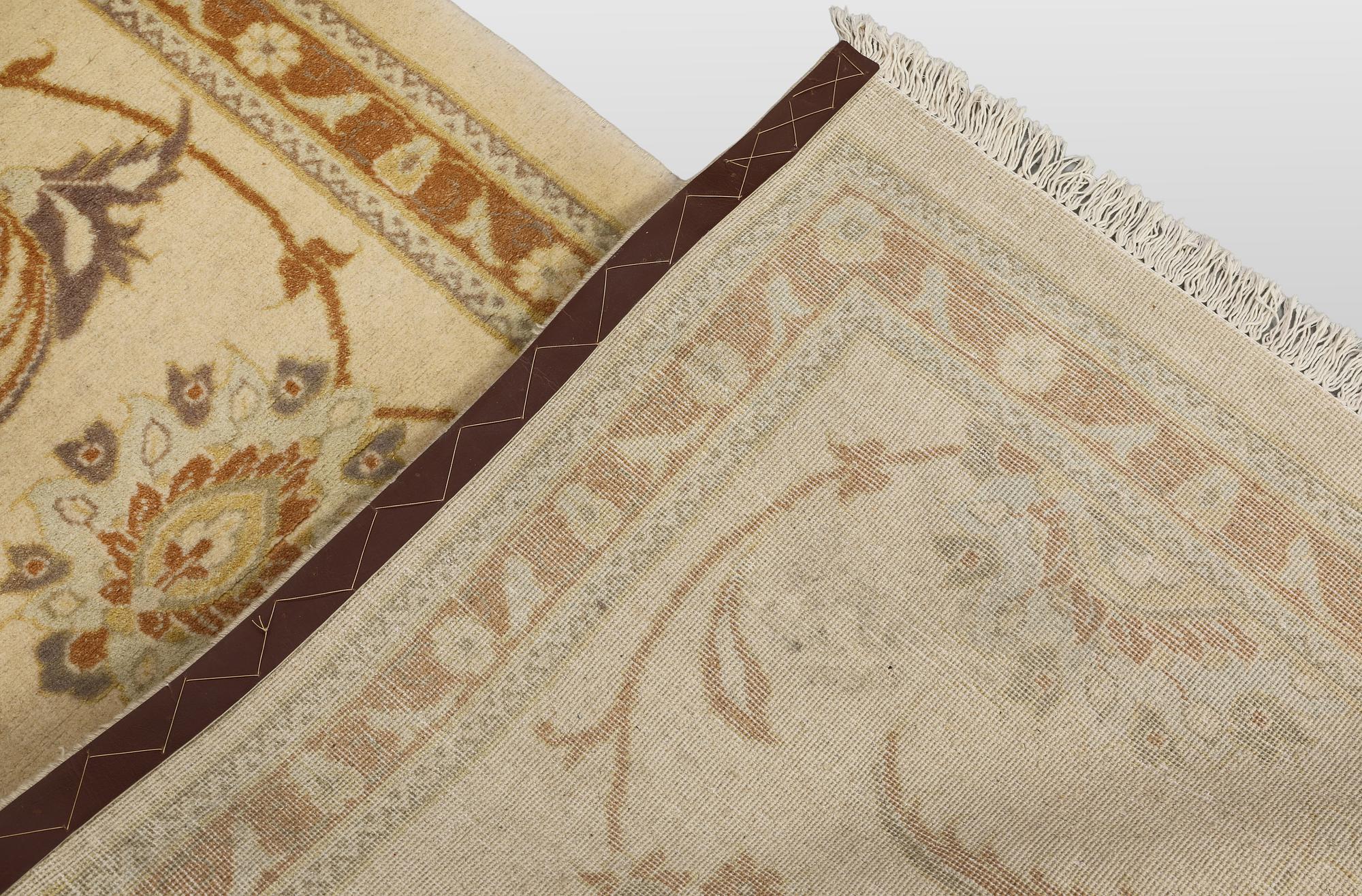 A runner carpet, Tabriz, 398 x 81 cm.