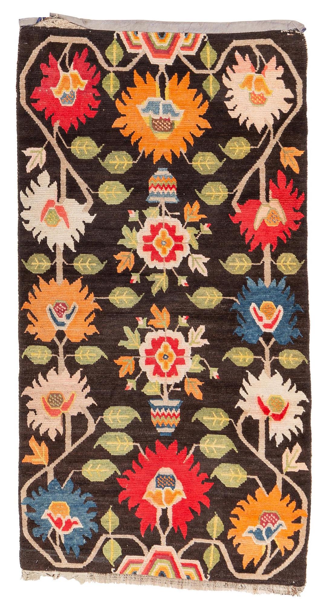 An antique Tibetan rug, Qing dynasty, circa 1900. Measure 173 x90 cm.