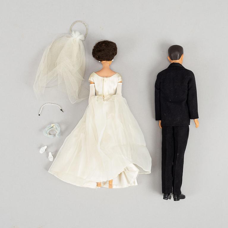 A collection of four Mattel 1960's Barbiedolls with accessories.