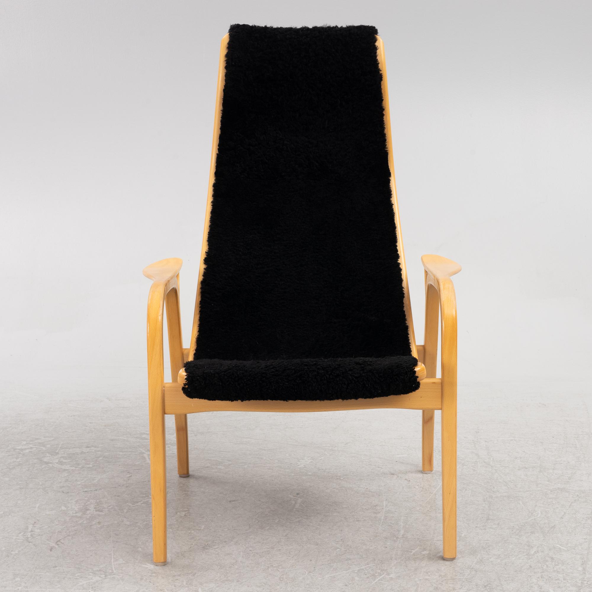 Yngve Ekström, an armchair and a footstool, "Lamino", Swedese, second half of the 20th century.