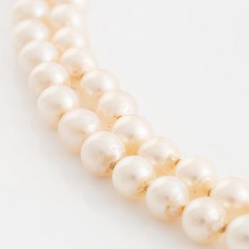 Two strand cultured pearl necklace, 18K gold clasp with rutile quartz.
