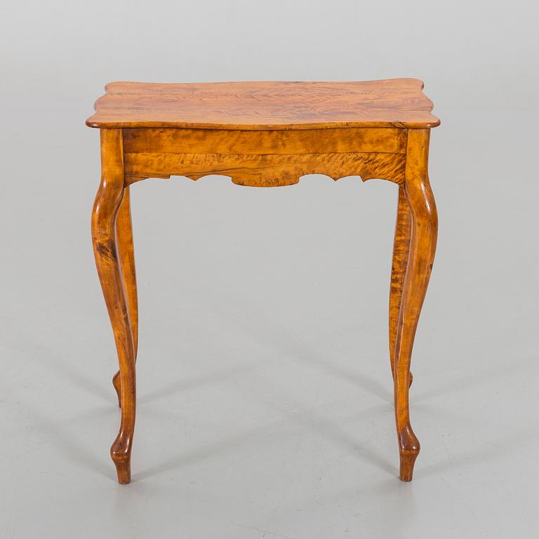 A Rococo style table late 19th century.