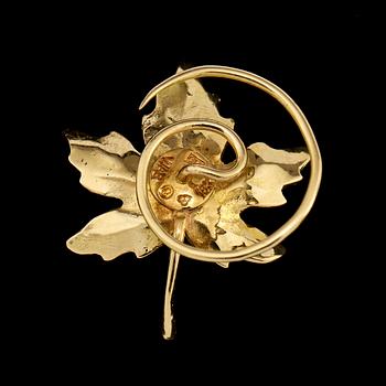 BROSCH, 18k guld samt emalj, WA Bolin, Stockholm, 1952. Vikt 3 g.