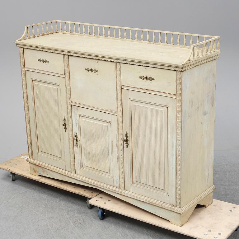 An early 19th Century painted late Gustavian cupboard.