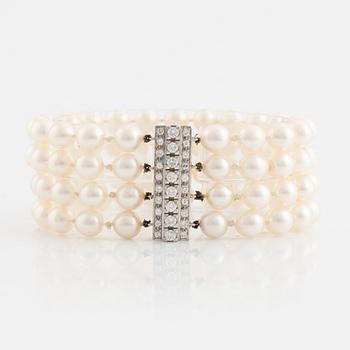 Four strand cultured pearl bracelet, clasp white gold with brilliant cut diamonds.