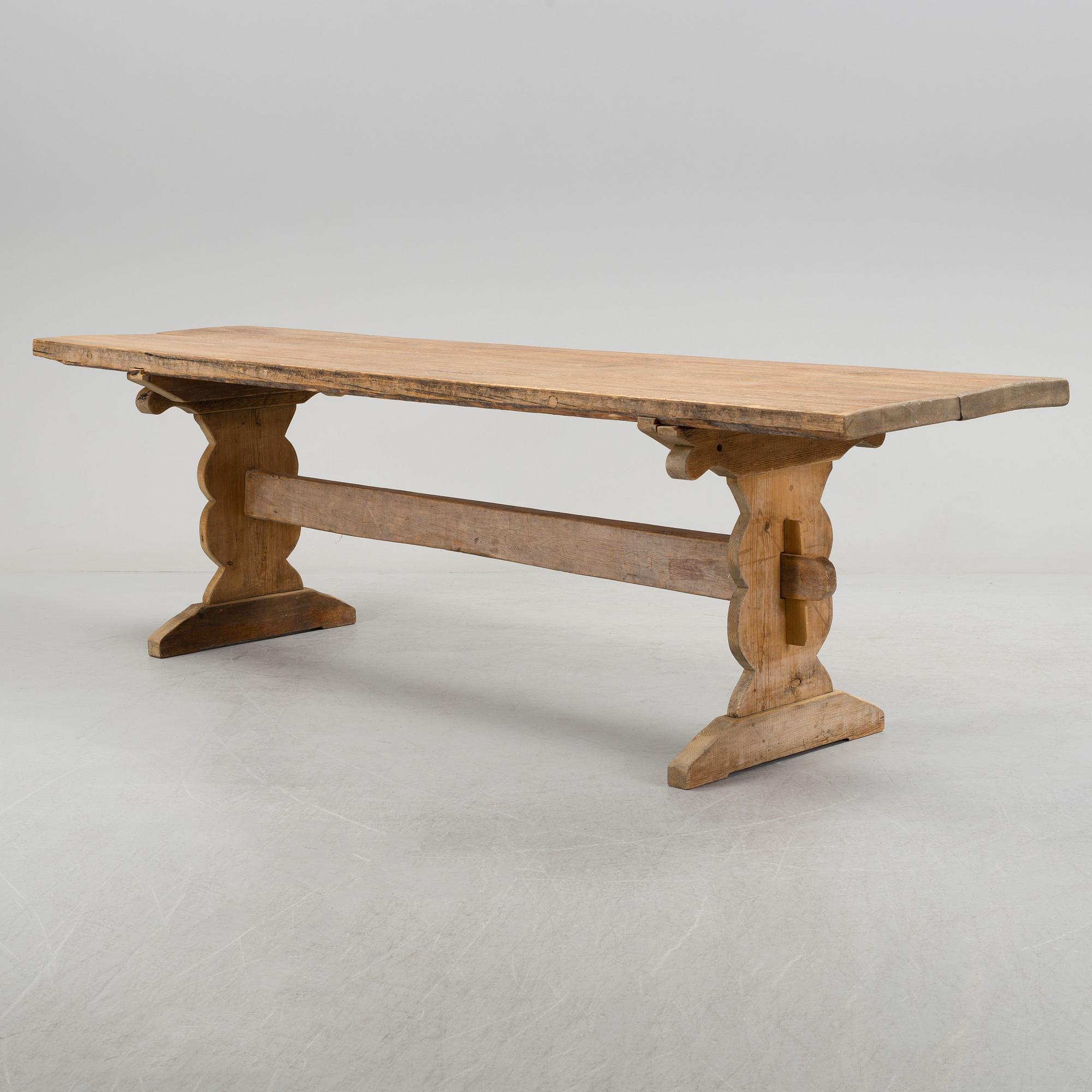 A 20th century pine table.