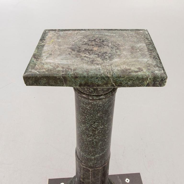 An early 1900s marble pedestal.