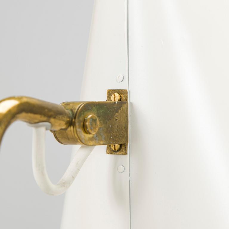 Paavo Tynell, a mid-20th century K10-10 floor lamp for Taito.
