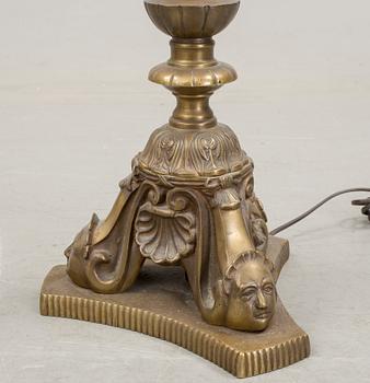 a early 20h Century brass floor lamp.
